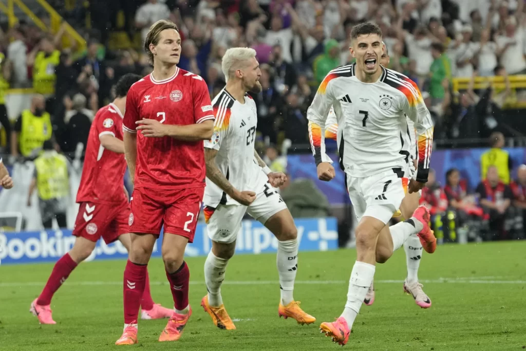 Germany beats Denmark 2-0 to advance to Euro 2024 quarterfinals after storm stops play - Socceronlinew